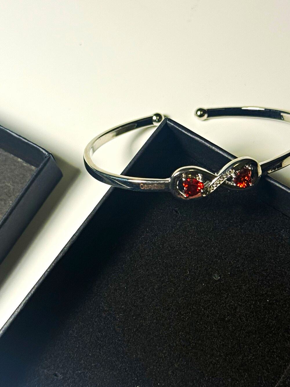 Caroline Sterling Silver .925 Infinity Cuff Bracelet w/ Round Red Stones Signed